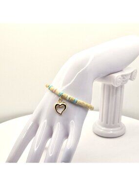 Gold Toned And Pastel Beaded Stretch Bracelet With Heart Charm